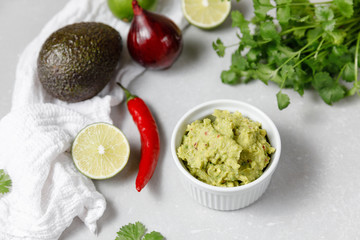 Mexican guacamole sauce with ingredients