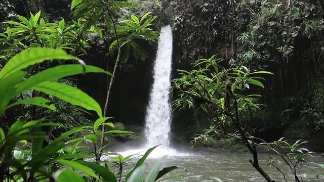 Waterfall in tropical rainforest of Colombia in the amazon region of the country.