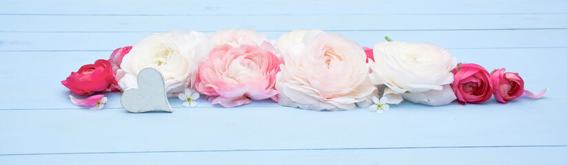 Fototapeta na wymiar Mother's Day, Valentine's Day, Wedding and Women's Day banner with beautiful ranunculus and heart