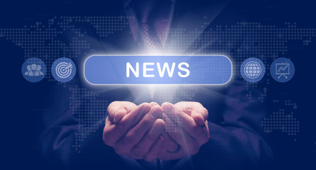 Businessmans cupped hands holding an News business concept on a computerised display.