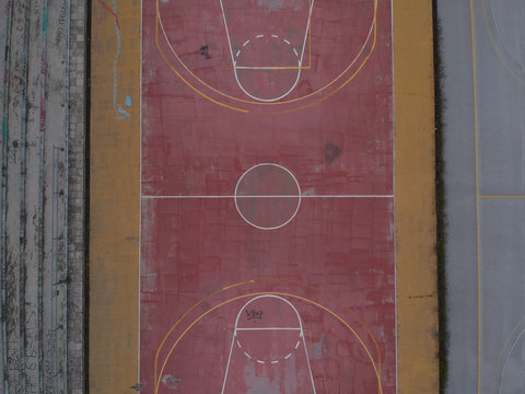 Aerial drone shot over basketball courts in a sports complex in Poseidonio, Thessaloniki Greece