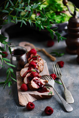 Pork tenderloin with raspberry sauce.