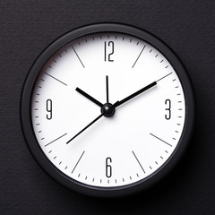 Balck Alarm Clock on black background.