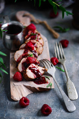 Pork tenderloin with raspberry sauce.