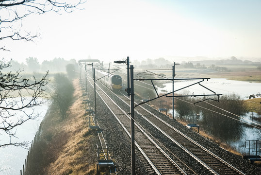 Virgin Train Express Passenger Train In The Countryside