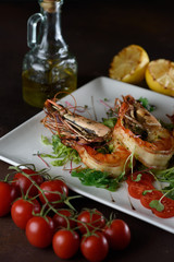 giant prawns with vegetables on a square plate