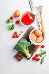 Healthy vegetables broccoli, tomato and bell pepper and eggs