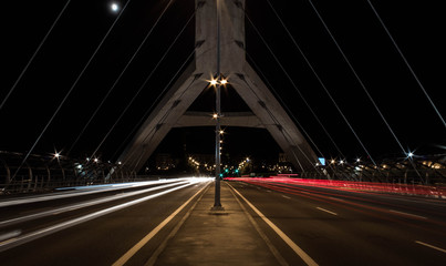 Fototapeta na wymiar Long exposure photo in a bridge. Cars' Lights