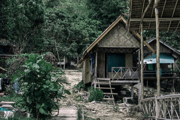 A house stands near the jungle in Thailand