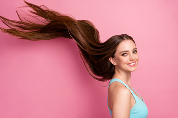 Portrait of her she nice attractive lovely charming cheerful cheery straight-haired girl ideal silky hair flying anti dander dandruff procedure isolated on pink pastel color background