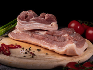 fresh raw meat on old wooden table