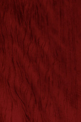 Deep red colored wood grain textured background. Beautiful pattern, bright vibrant colors. Rustic hardwood, background wallpaper