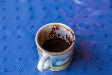 Obraz na płótnie Canvas cup of Turkish coffee, traditionally using for fortune telling. traditional porcelain turkish coffee cup