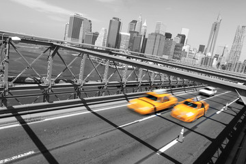 Taxi cab crossing the Brooklyn Bridge in New York