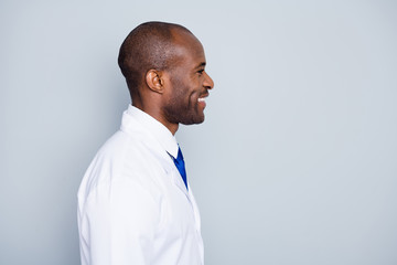 Profile photo of doctor handsome dark skin guy virologist look friendly empty space visit corona...