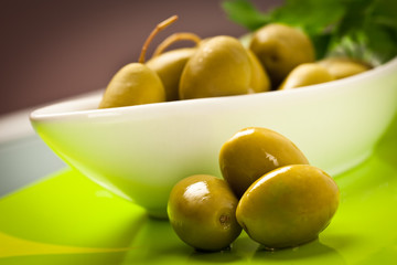 "beautiful Cerignola olives" in white bowl and green plate
