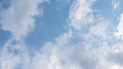 Naklejka na ściany i meble Bright blue sky Gradually cloud on background, with copy space for your text.
