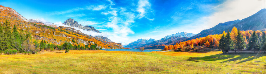 Charming autumn scene in Swiss Alps and views of Sils Lake (Silsersee).