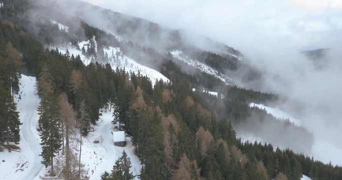 Aerial Drone View Of Snowy Austrian Alps On Cloudy Day