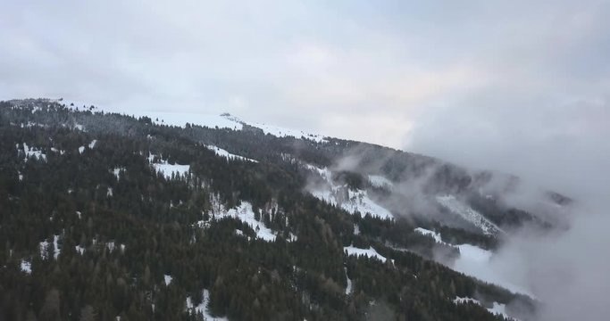Aerial Drone View Of Snowy Austrian Alps On Cloudy Day