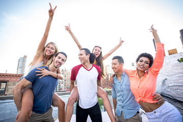 Group of friends having party on a rooftop