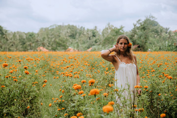 Girl in flower plantation