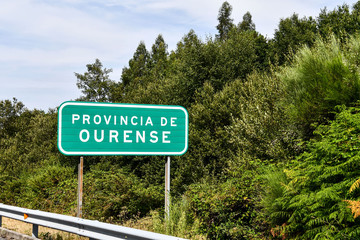 green road ourense sign, photo as a background