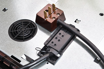 Connect the cable to the contacts of the hob electric induction panel. View of the hob from the...