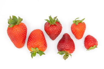 group of strawberries in line