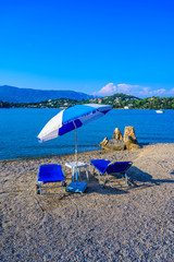 Fototapeta na wymiar Gouvia beach is close to Kerkyra is a paradise beach with crystal clear azure water in Corfu, Ionian island, Greece, Europe