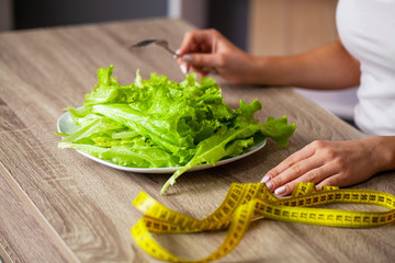 Woman cares about the figure and maintains a strict diet