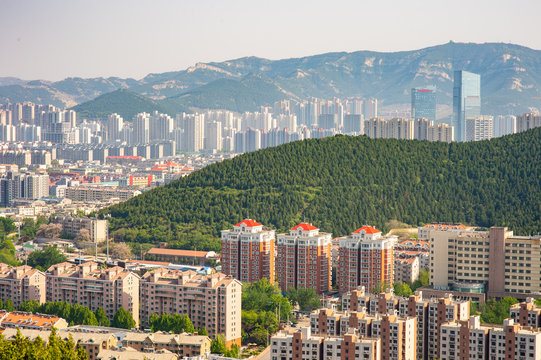 city view of Jinan from Mount Langmao. Jinan is surrounded by mountains. 