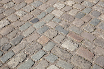 rötliches und graues Kopfsteinpflaster