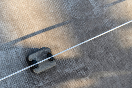 Lightning rod with concrete foot.