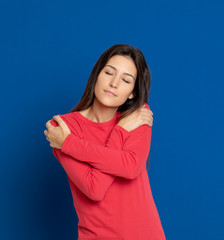 Brunette young woman wearing a red T-shirt