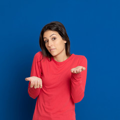 Fototapeta premium Brunette young woman wearing a red T-shirt