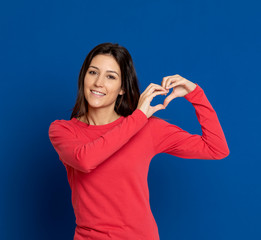 Fototapeta premium Brunette young woman wearing a red T-shirt