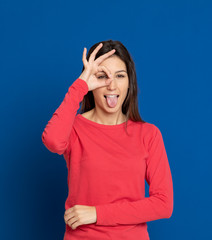 Brunette young woman wearing a red T-shirt