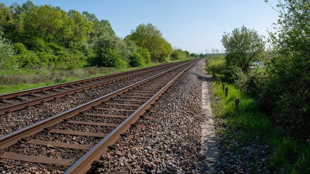straight parallel railroad tracks