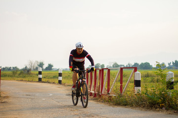 Fototapeta premium Professional athlete ride on a mountain bike. Extreme sport concept
