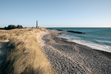 Lighthouse and dunes, blue sky, Skagen, Denmark, Scandinavia - obrazy, fototapety, plakaty