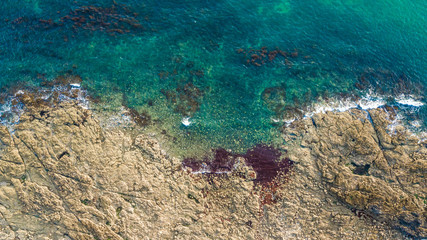 Island on sea, bird's eyes view with drone