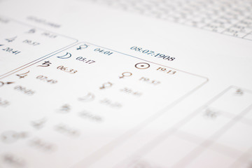 The workplace of a modern astrologer. Accessories of an astrologer. Printouts of computer...