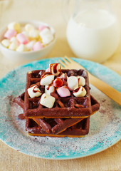 Chocolate waffles with marshmallow for breakfast