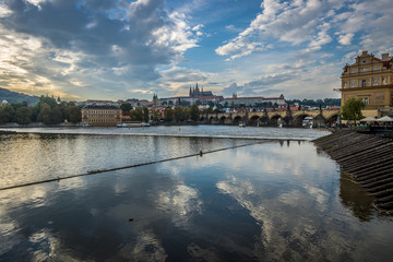 Fototapeta premium Prague. Chech Republic. Charles Bridge and the Vltava River. The Charles Bridge is a famous historic bridge that crosses the Vltava river in Prague.
