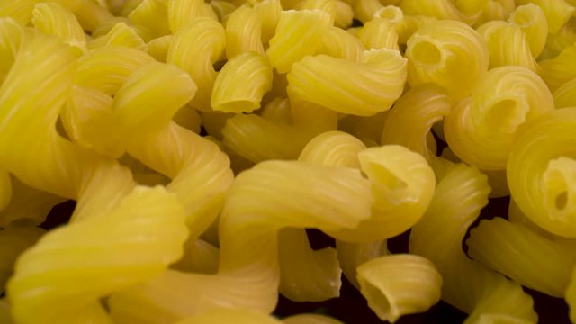 Uncooked cavatappi pasta, close up