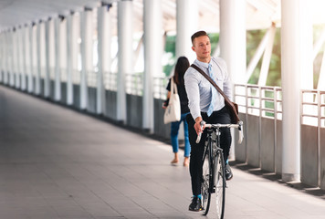 Handsome Smile Caucasian Businessman Goto Work with Bicycle in Car Free Day in the City - Urban Lifestyle