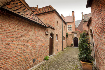 Empty city streets in area of historical Beguinage, 13th century complex houses for beguines women