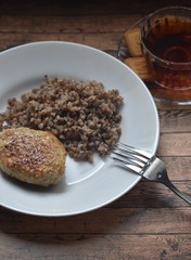 Simple lunch, porridge with cutlet