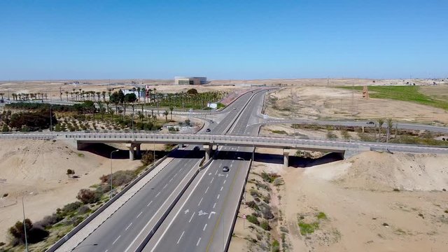 Flying over the highway to the overpass direction at south of Israel